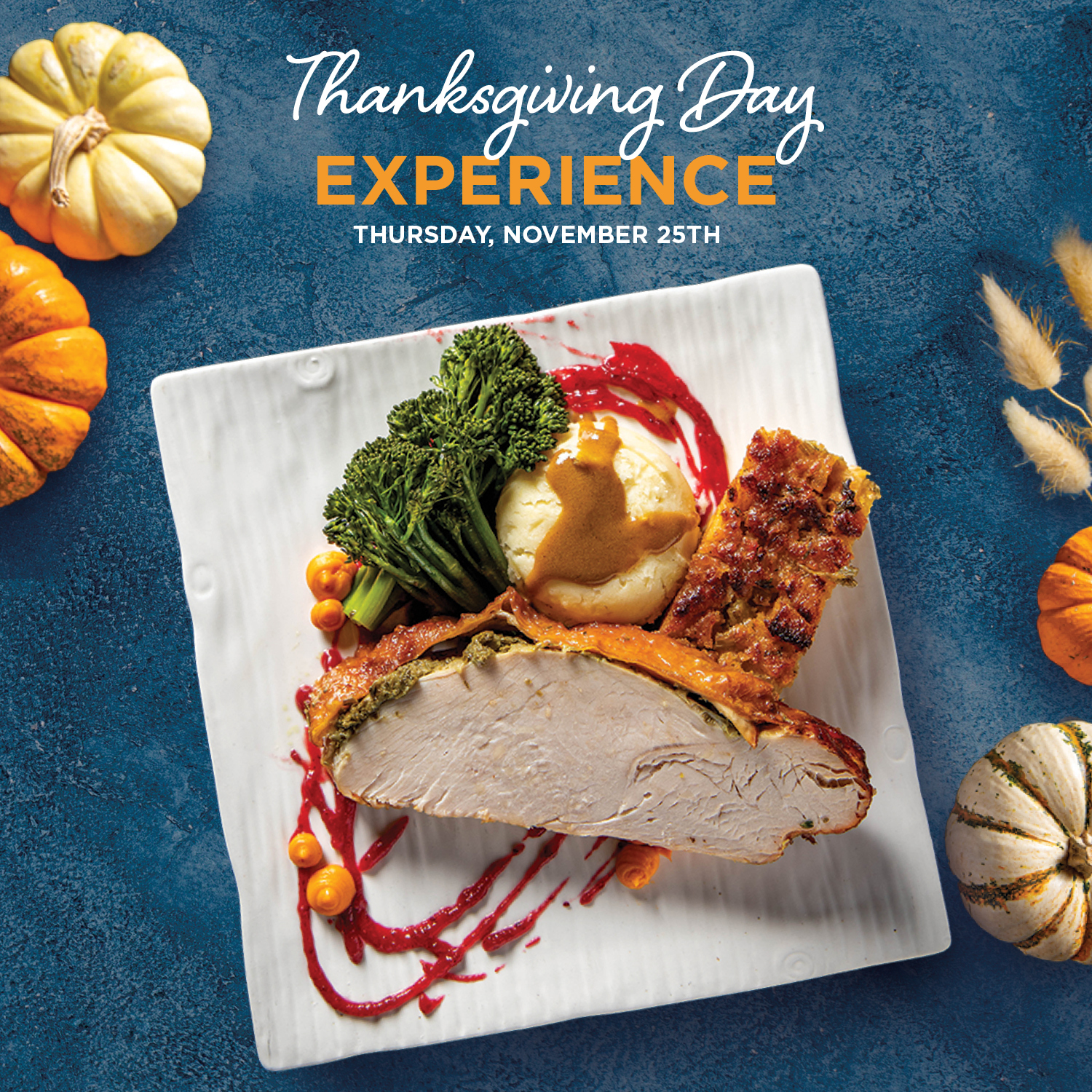 Thanksgiving dinner plate and pumpkins on a table