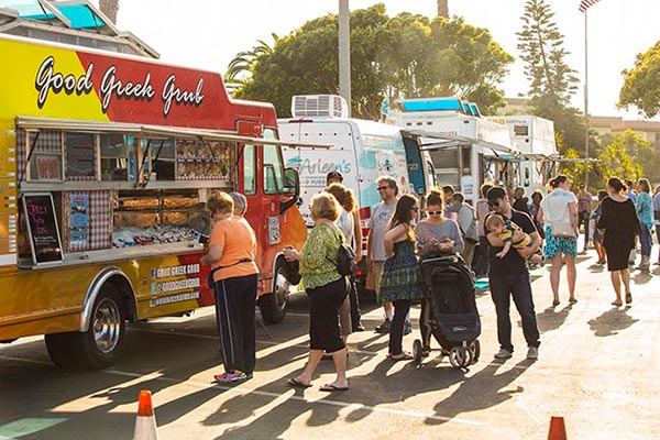 people in line at food trucks