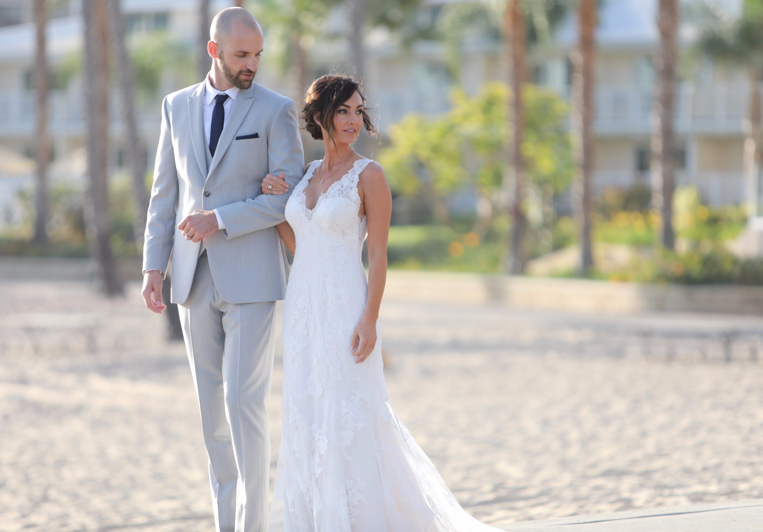 Wedding couple on sand at Marina' Mother's' Beach