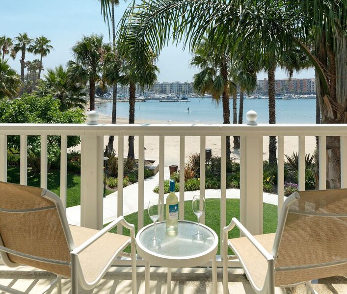 Chairs on balcony facing beach and water for Valentine's weekend in MDR