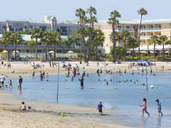 Marina Beach also goes by the local nickname, Mother's Beach, because of the area's family-friendly amenities including covered picnic pavilions, wave-free swimming area, and a children's playground.