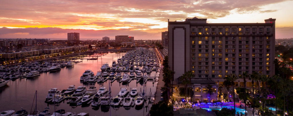 sunset sky overlooking boats in the harbor